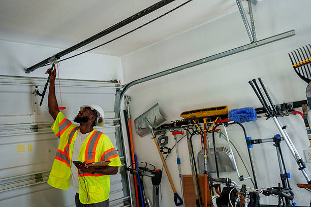 Professional Garage Door Panel Replacement technician working in Delaware County County, PA